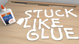 Stuck Like Glue" written with glue.