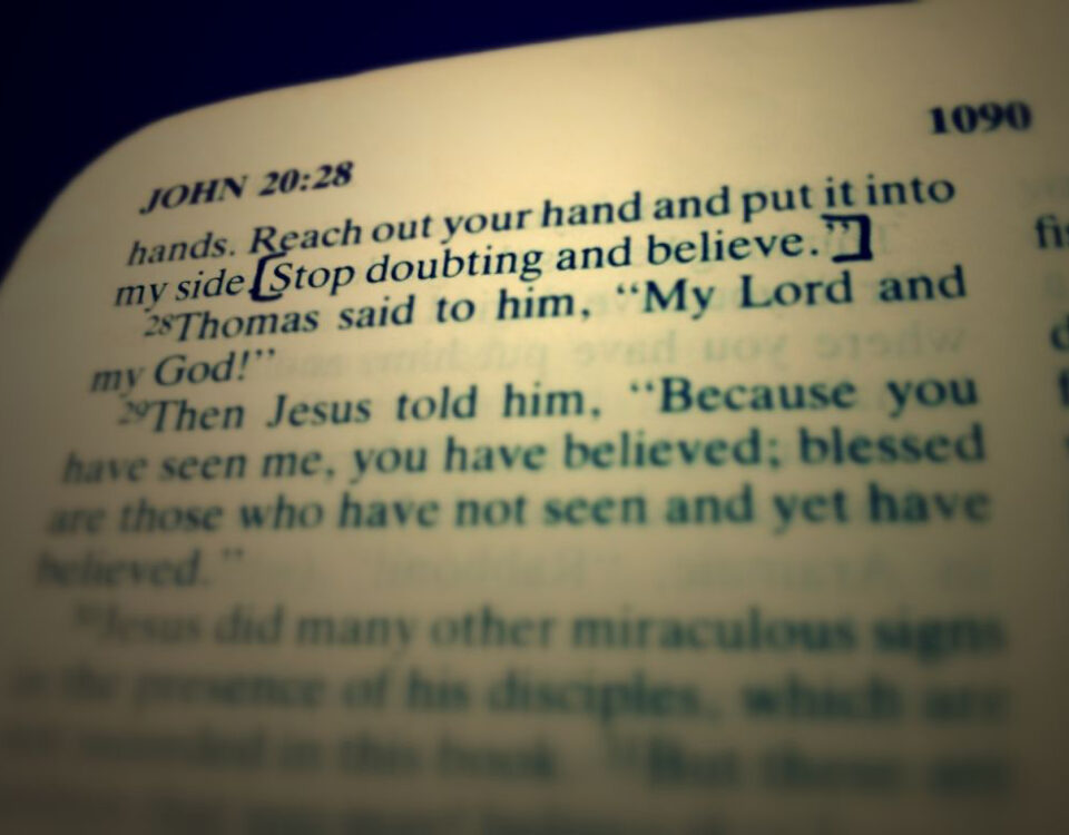 Highlighted Bible verse with focus on belief.