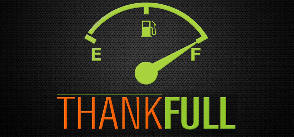 Fuel gauge with "Thankfull" text, full tank.