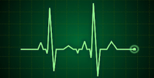 Heartbeat monitor graph on green background.