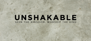 Unshakable text on textured gray background.