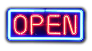 Neon "Open" sign with blue border.