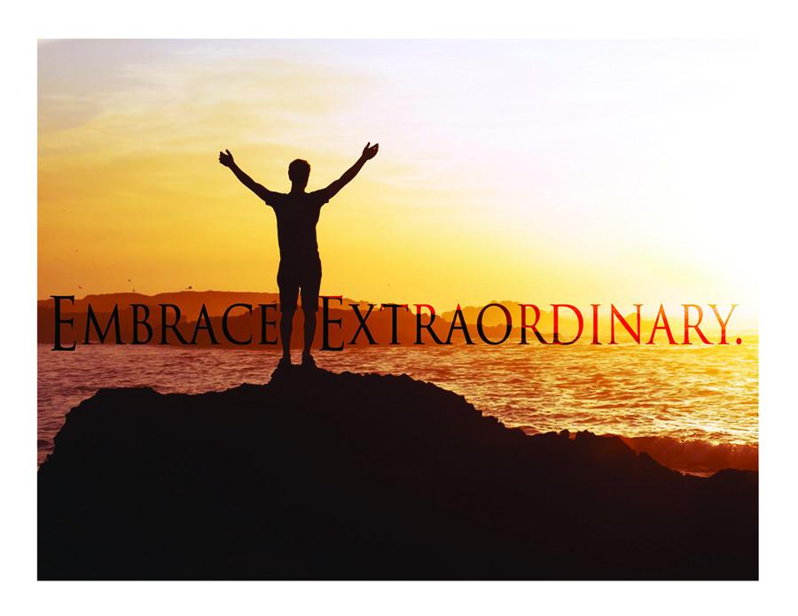 Silhouette embracing sunset with "Embrace Extraordinary.