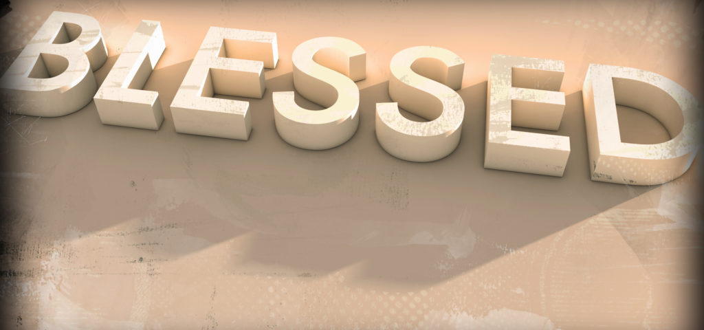 Blessed" written in large white letters.