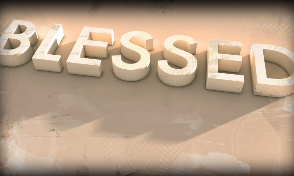 Blessed" written in large white letters.